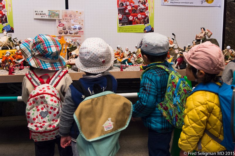 20150312_103734 D4S.jpg - Children visiting museum area at Nagoya Castle.  Well-mannered and quite interested in what they see.